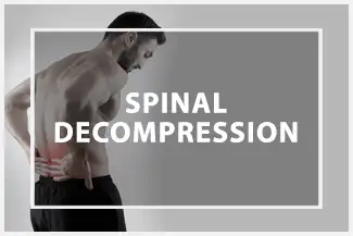 Spinal decompression promotional image featuring a person holding their lower back in pain